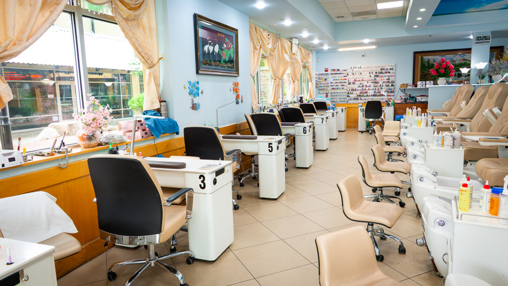 Manicure stations along the salon windows